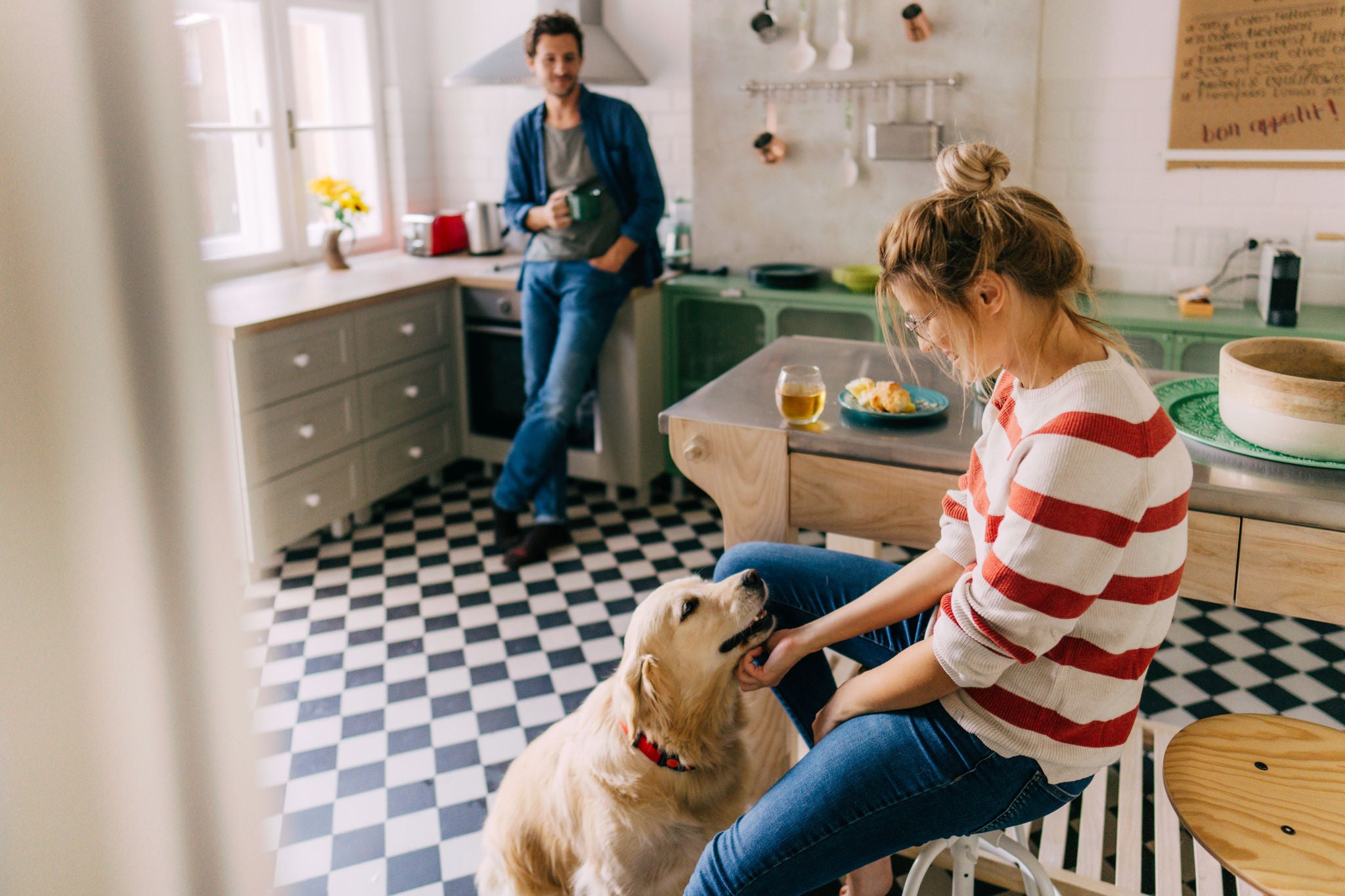 Photo of happy family in a kitchen at the morning